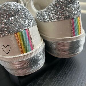 Stylish White Sneakers with Silver Accents by dolce vita walk w pride rainbow